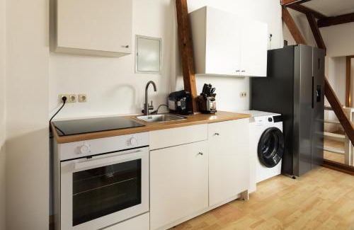 Tempelhof Apartment | Helle & gemütliche Dachwohnung mit Terasse